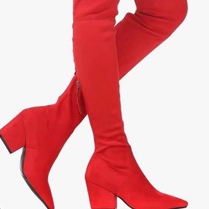 Red over-the-knee suede Shoe And Tale boots with back zipper.